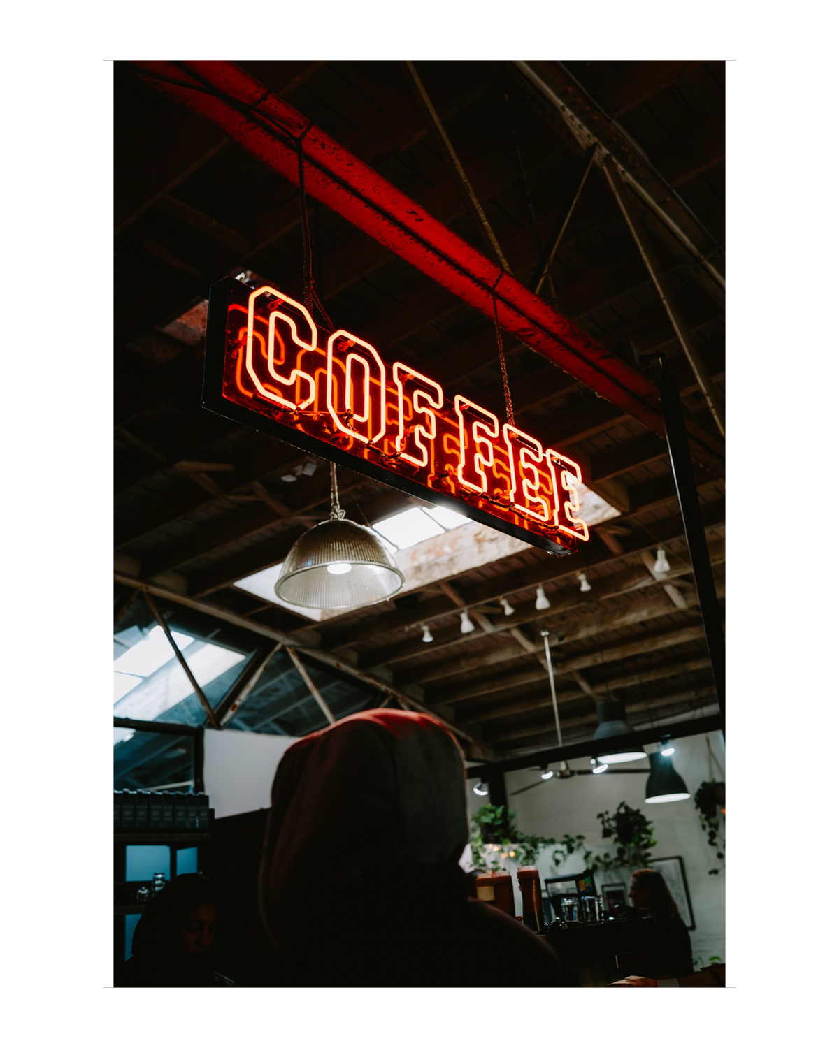 A coffee-shop photograph framed with the reusable white-border template