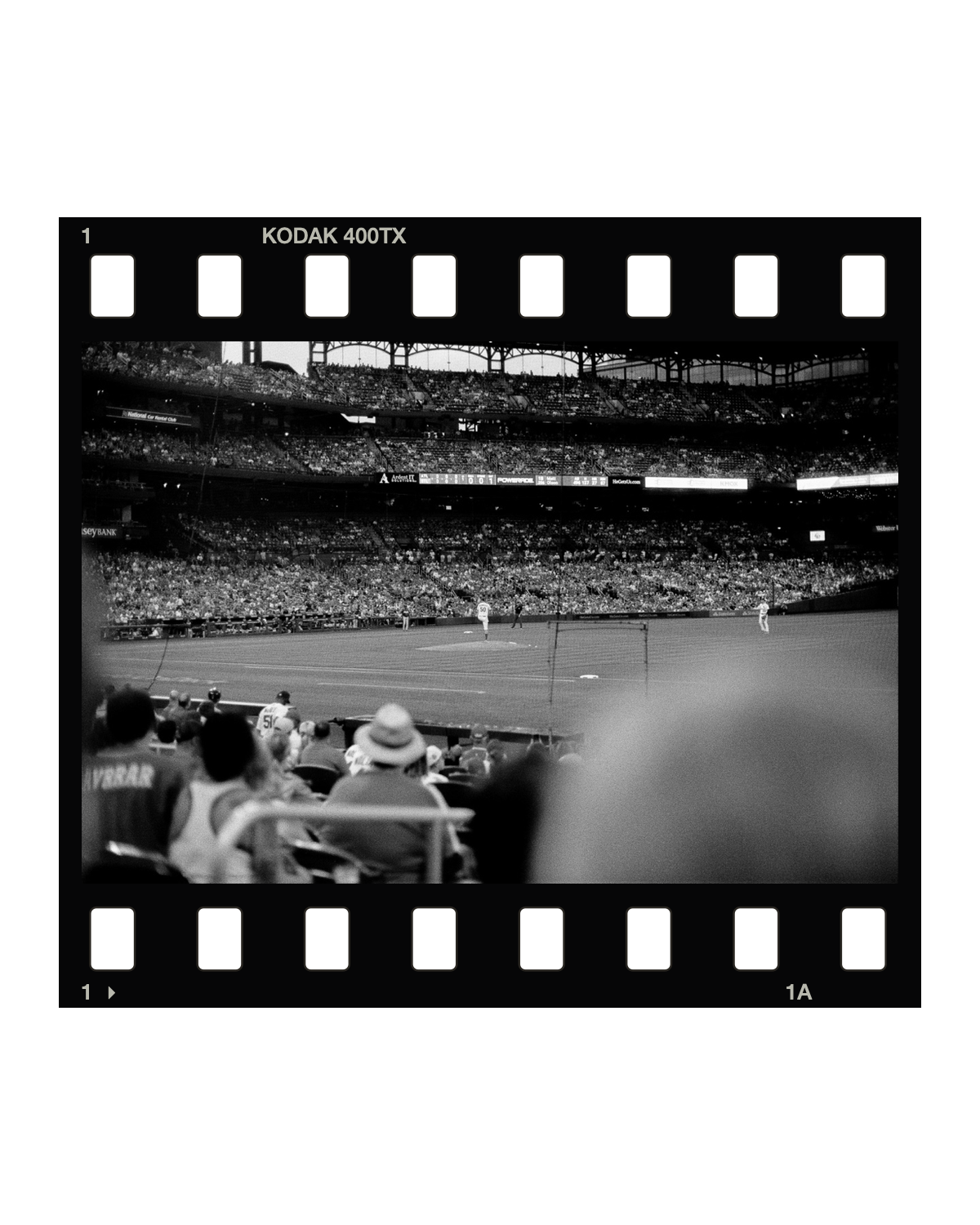 A black-and-white baseball photograph with a native Kodak Tri-X film-style border on a white background
